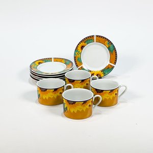 Lote siguiente: Juego de 4 Tazas y 6 Platos de Porcelana con Decoración Floral