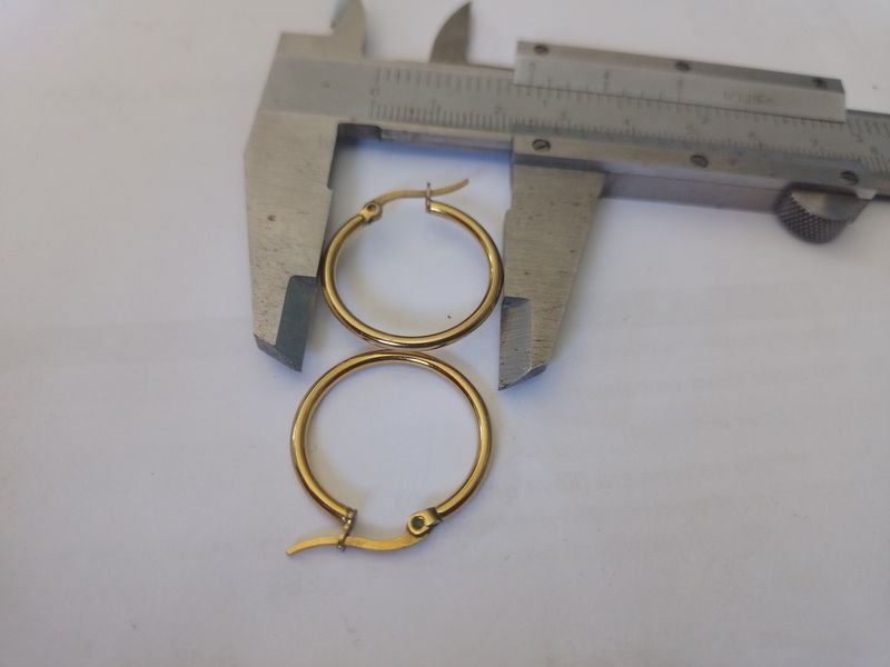 Lote siguiente: Aros de Oro en Calibrador