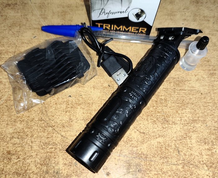 Cortapelos recargables con accesorios, nueva en caja - imagen 2