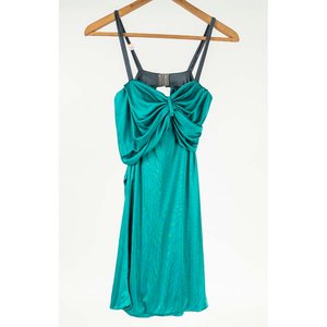 Lote anterior: Vestido Verde Esmeralda Ricky Sarkany Talle XS