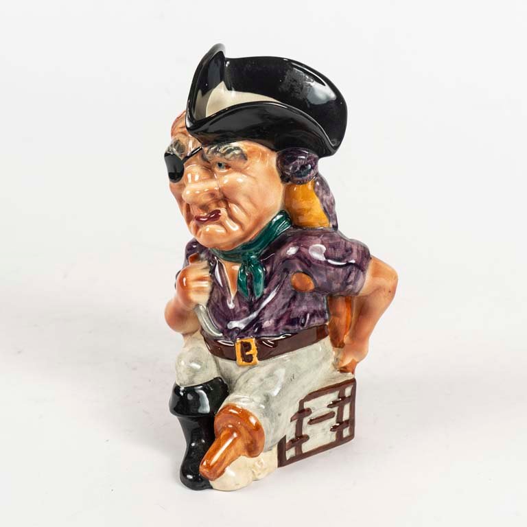 Lote siguiente: Jarra de cerveza inglesa con figura pirata
