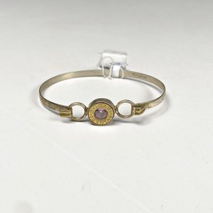 Lote siguiente: Pulsera Rígida de Plata con Piedra Rosa y Detalles Dorados