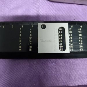 Lote de Colección: Lata Antigua, Regla Multiplicadora Renate y Encendedor Amersix - imagen 2