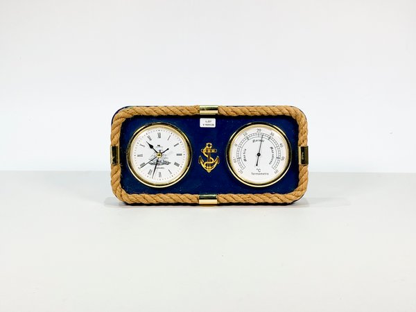 Reloj de pared azul con tema naval y termómetro