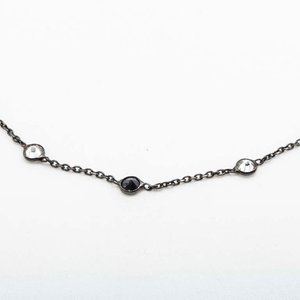 Lote anterior: Gargantilla de Plata con Rodio Negro y Piedras