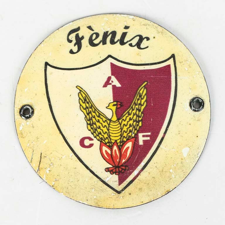 Lote siguiente: Escudo de Fénix de chapa litografiada