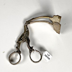 Lote siguiente: Pinza de Metal con Diseño de Pelícano