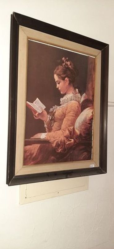 Lote anterior: Pintura de mujer leyendo un libro en marco de madera