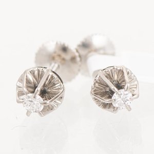 Lote siguiente: Par de Tornillos de Oro 18k con Brillantes