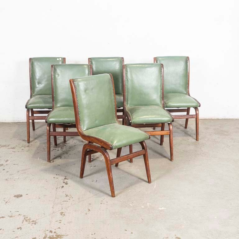 Lote anterior: Sillas americanas tapizadas en cuero verde con tachas