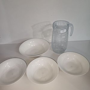 Lote anterior: Jarra de Vidrio y Cuatro Boles de Loza Blanca