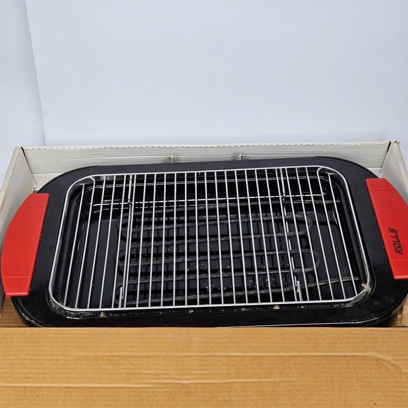 Parrilla eléctrica en su caja, funcionando - imagen 2