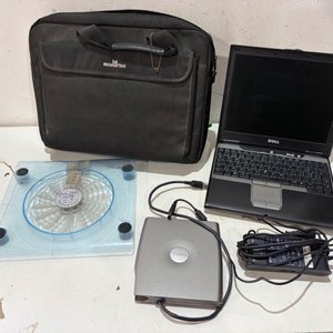 Lote siguiente: Notebook Dell con Cooler y Accesorios