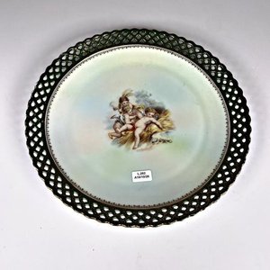 Lote siguiente: Plato de Porcelana Bavaria Schumann con Querubines y Borde Calado
