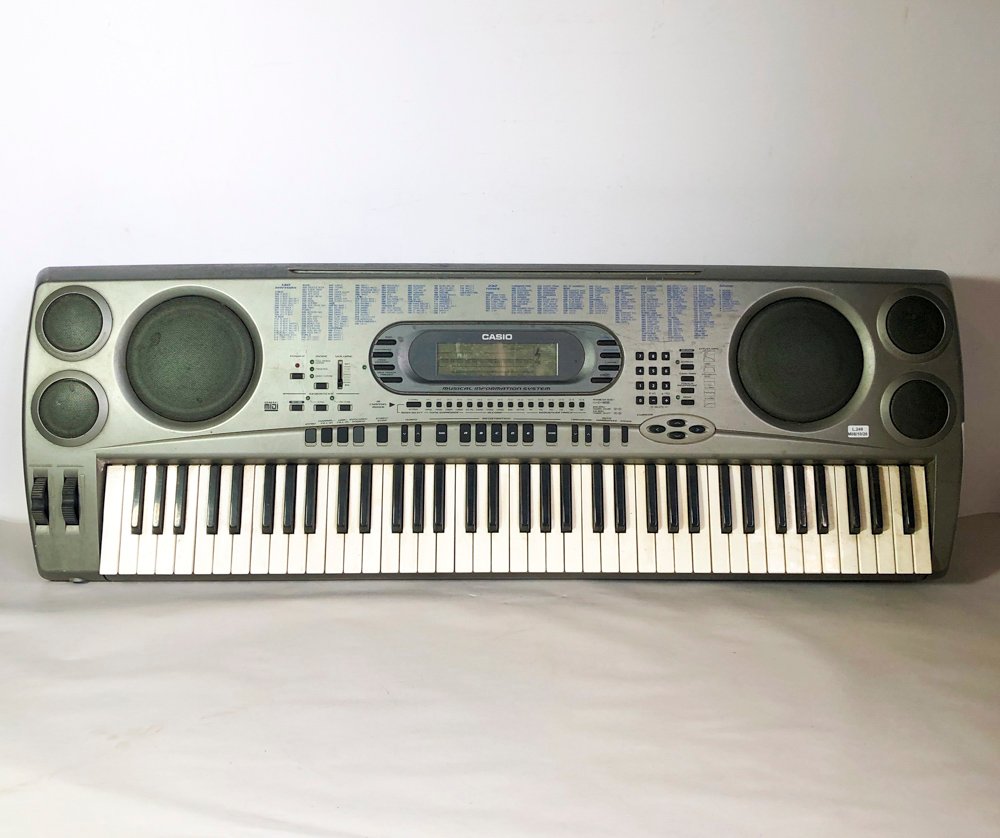 Teclado/Organo Casio con parlantes integrados
