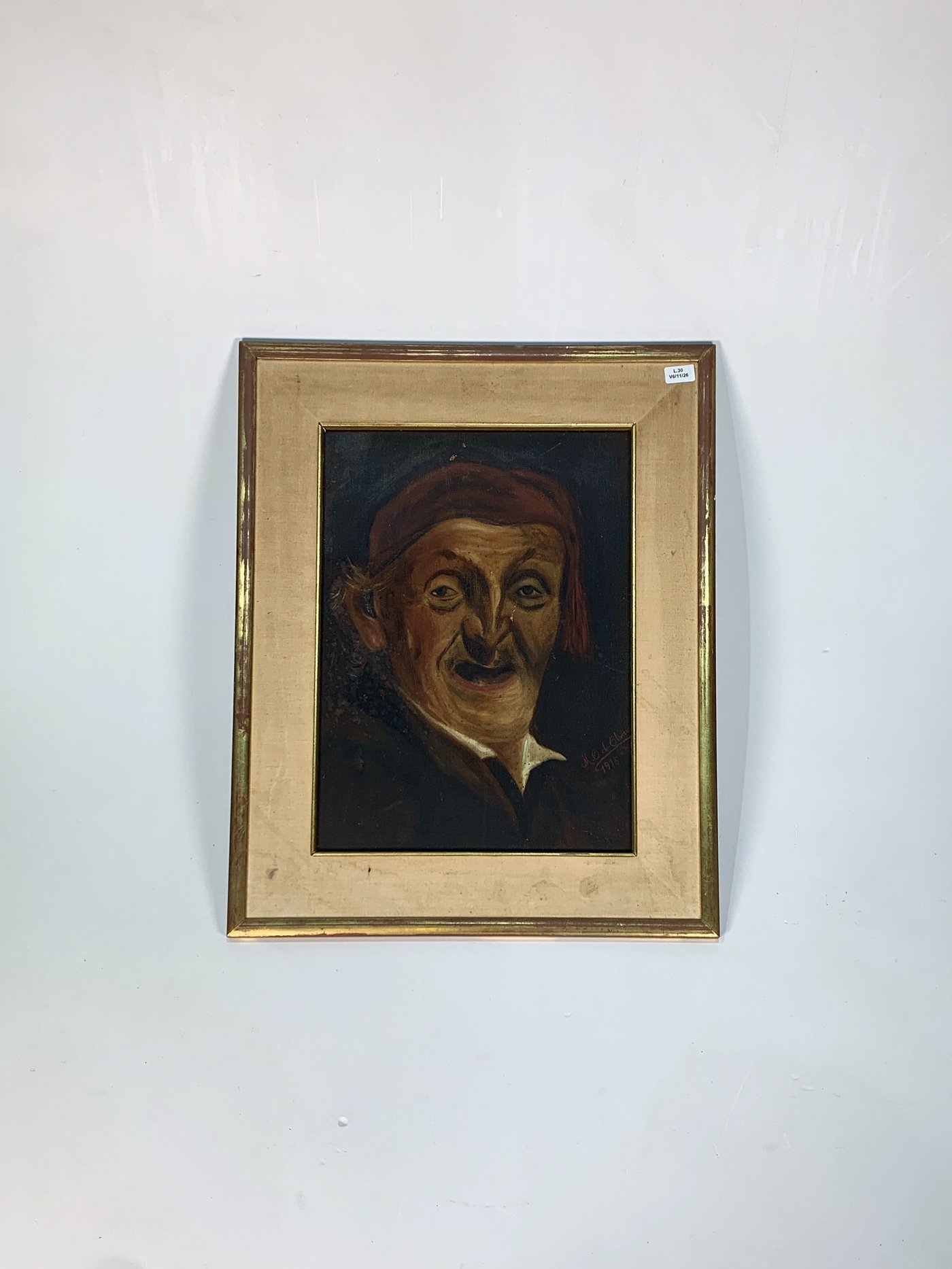 Cuadro al óleo: Retrato de anciano con pañuelo, firmado M.G. de Oliveira (1915)