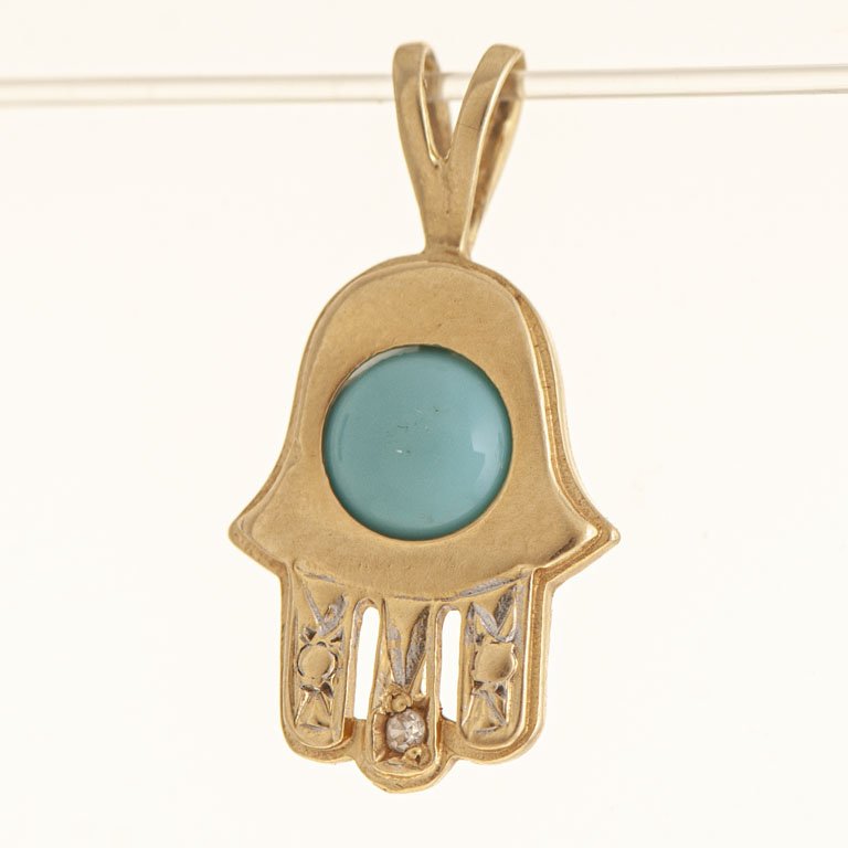 Dije de oro con piedra celeste