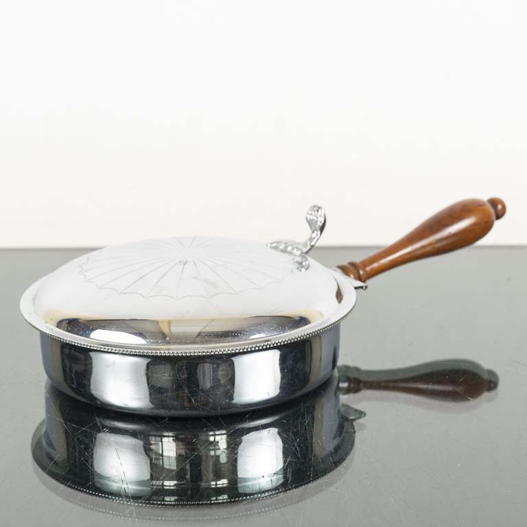 Lote siguiente: Colillero de platina con mango de madera - Detalle en el interior