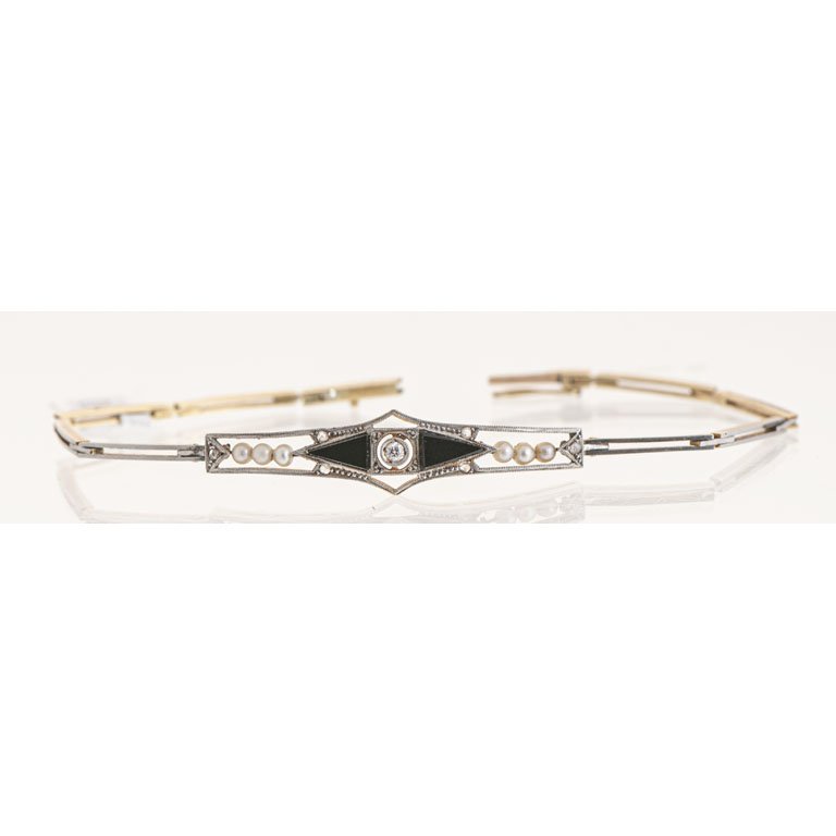 Lote siguiente: Pulsera de oro con brillante y perlitas