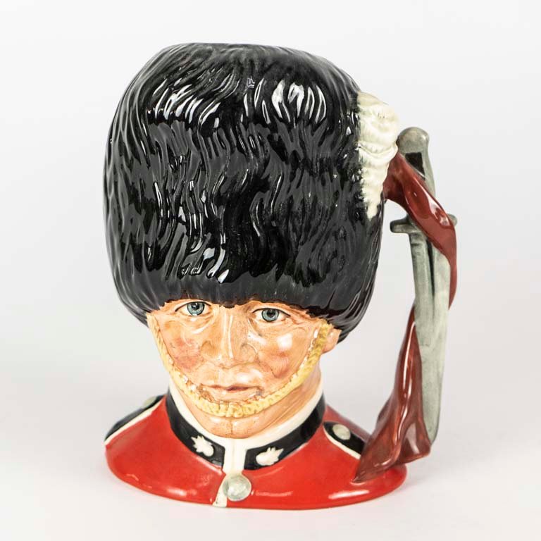 Lote siguiente: Jarra de porcelana Royal Doulton personaje The Guardsman