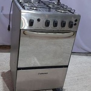 Cocina a Gas Bronx Plateada 4 Hornallas con Horno - imagen 1
