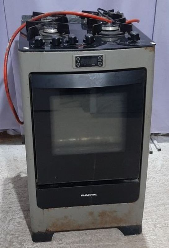 Cocina a Gas Punktal Negra 4 Hornallas con Horno