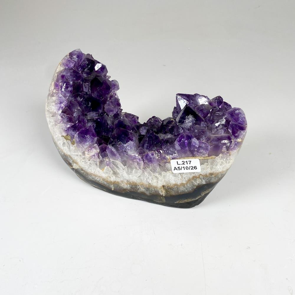 Piedra amatista con base 18 x 12 altura