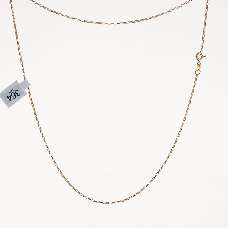 Lote siguiente: Cadena de oro 18k larga con anillos