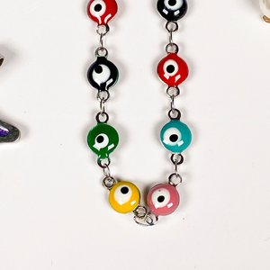 Lote de Cuatro Piezas de Joyería: Pulsera, Caravanas y Colgantes - imagen 7