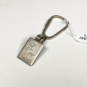 Lote siguiente: Llavero de Plata con Diseño Grabado