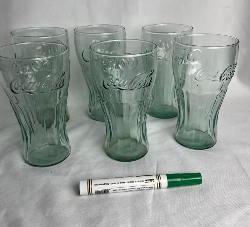 Lote siguiente: Vasos coleccionables de vidrio con logo Coca Cola