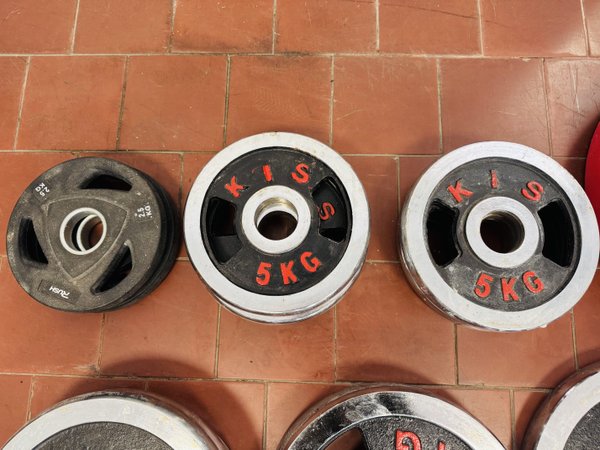 6 Discos Olímpicos de 5 kg Marca Kis y 2 Discos de 2.5 kg
