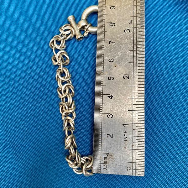 Antigua pulsera de plata con diseño entrelazado - imagen 4