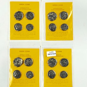 Lote anterior: Ocho Reproducciones de Monedas Griegas Plateadas