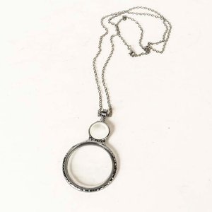 Lote anterior: Collar con Lupa Decorativa Plateada