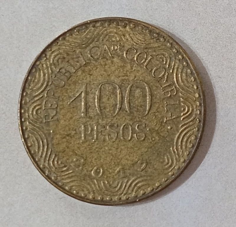 Lote siguiente: Moneda de Colombia de 100 Pesos en oro