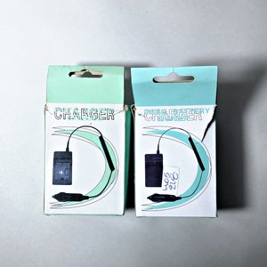 Lote: Afeitadora Eléctrica, Cámara Fujifilm, Cargadores, Billetera y Lentes con Aumento - imagen 2