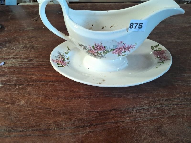 Lote siguiente: Vaso de cerámica Villeroy y Boch con plato incorporado