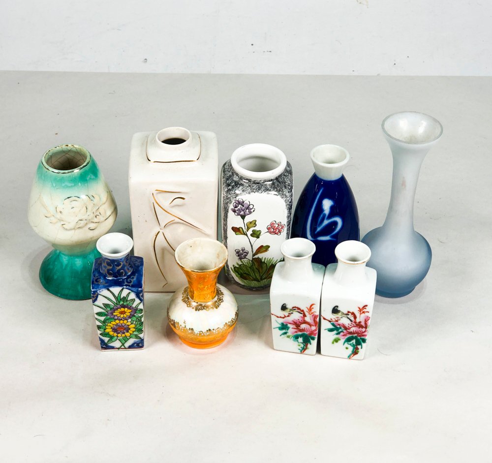 Lote anterior: Colección de floreros coloridos