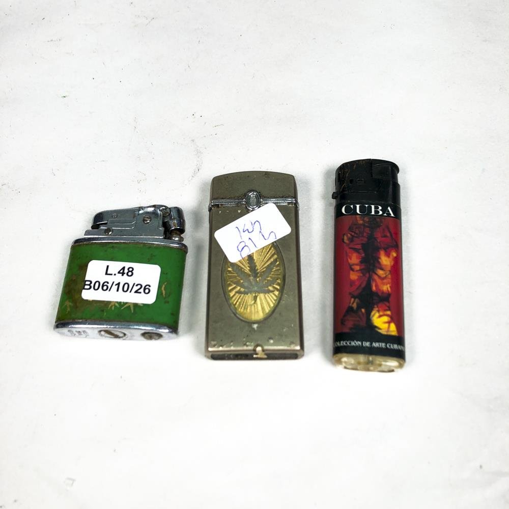 Tres encendedores antiguos de colección