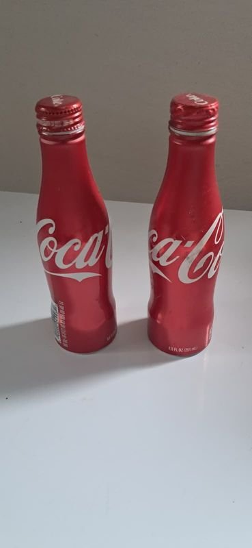 Dos Botellas de Aluminio Coca-Cola