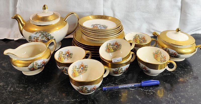 Lote anterior: Set de té bañado en oro 22 kt. - Hermoso conjunto de porcelana