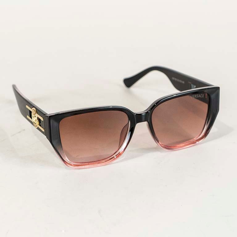 Lote siguiente: Lentes de sol Prada - Par de lentes con lente rosa y marco negro