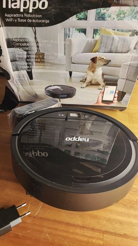 Aspiradora robot con base de carga y remoto
