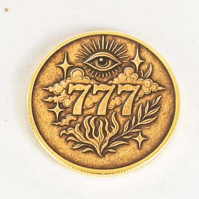 Lote anterior: Moneda con símbolo de ojo y hojas