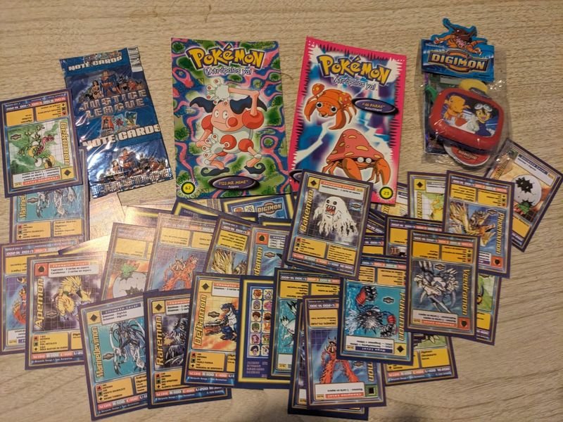 Lote siguiente: Tarjetas de colección Pokémon y Digimon
