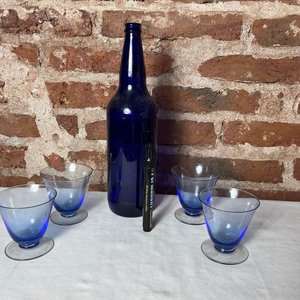 Lote anterior: Juego de 4 Copas de Vidrio Azul y Botella Vintage
