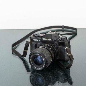 Lote siguiente: Cámara Cosina CT1EX con Lente 35-70mm