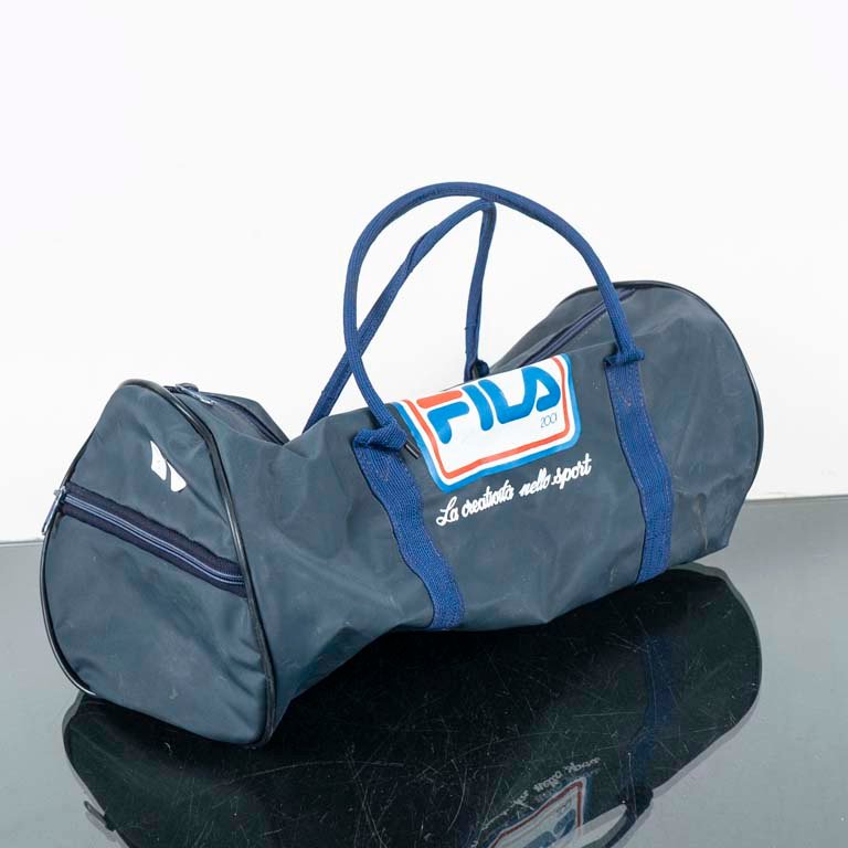 Lote anterior: Bolsos Fila Vintage con Detalles