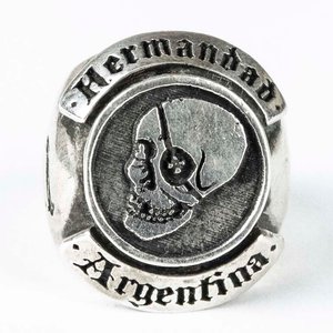 Lote siguiente: Anillo de Plata "Hermandad Argentina" con Calavera